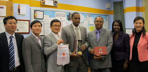 The China Delegation visited S.T.A.R. Early College School at Erasmus and exchanged gifts with the Principal